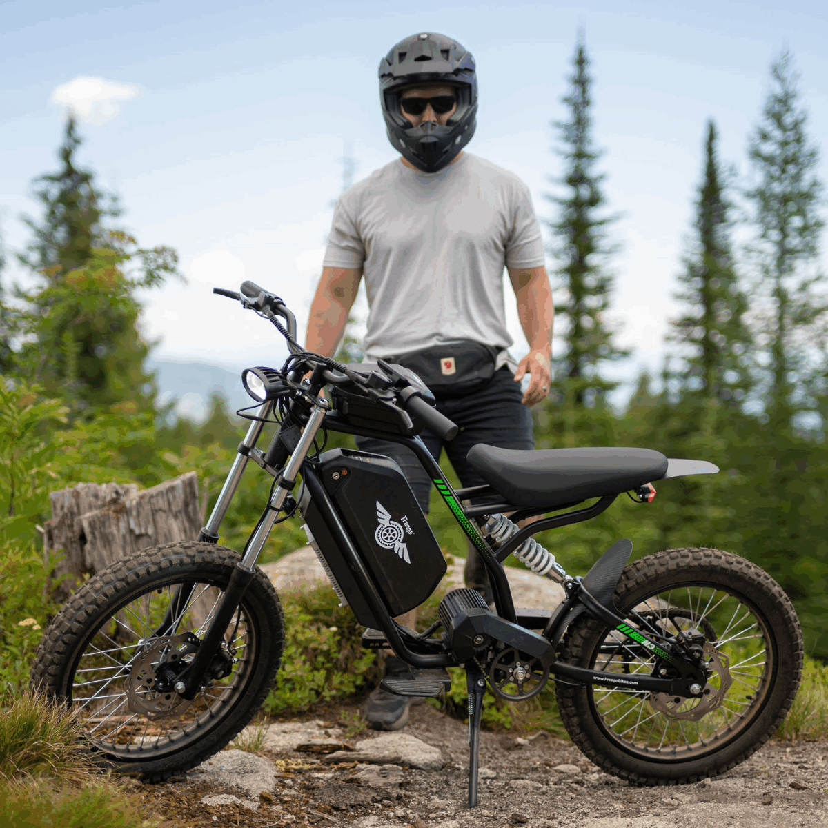 Person on a Nova 3 dirt bike in a forest setting