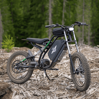 Freego Nova 3 off-road electric bike on a forest floor with trees in the background